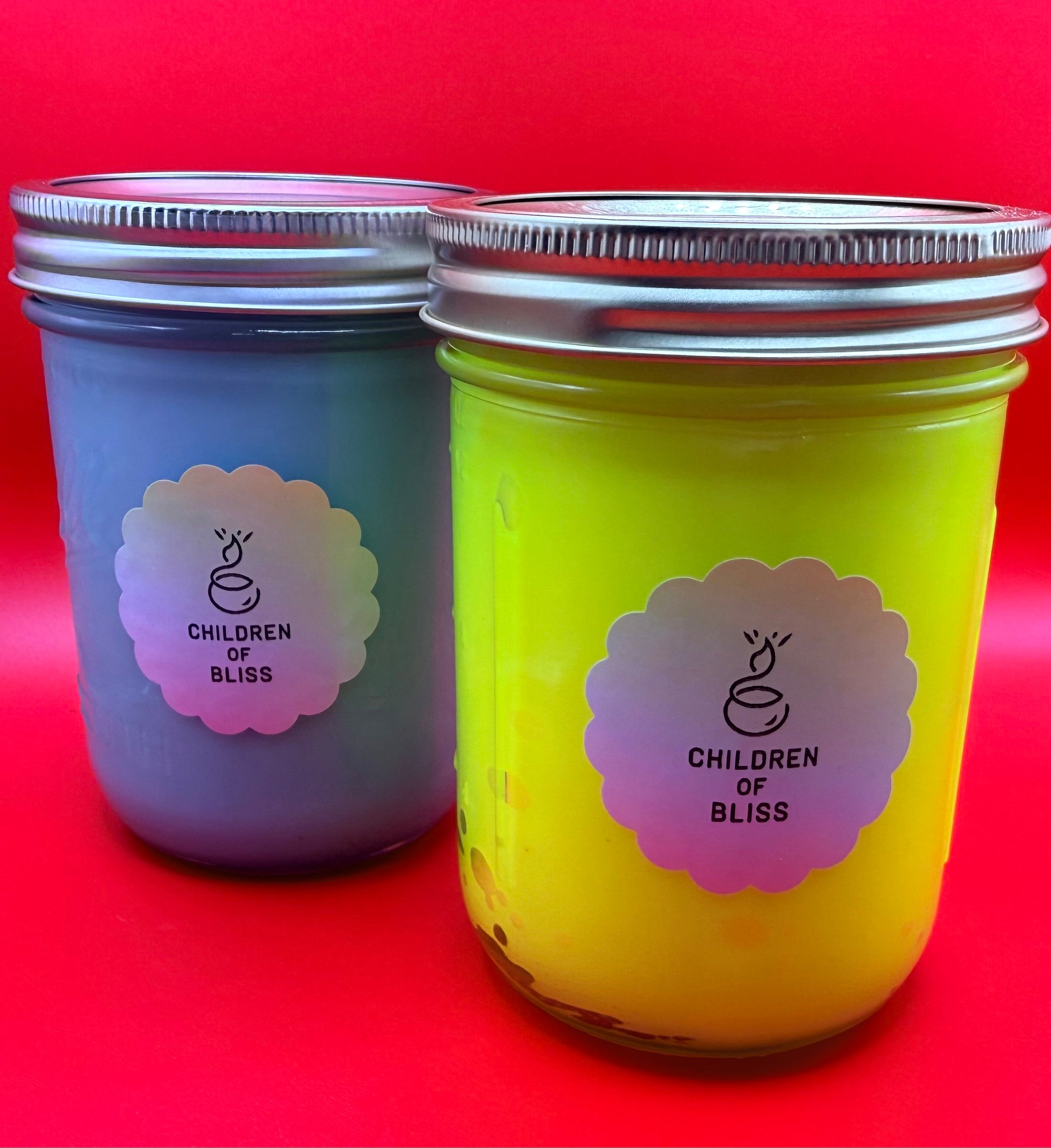 Espresso scented candle in a decorative tin or jar, optional color